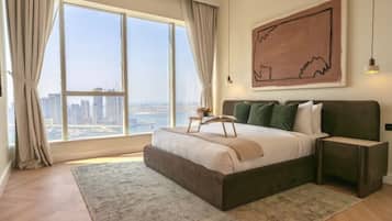 Deluxe-huoneisto, merinäköala | Tallelokero huoneessa, pimennysverhot, ilmainen Wi-Fi, vuodevaatteet