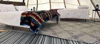 Rustic Elegance: Tipi Glamping by Wind River Mountains in Fort Washakie