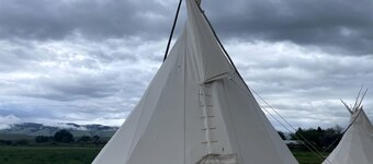 Rustic Elegance: Tipi Glamping by Wind River Mountains in Fort Washakie