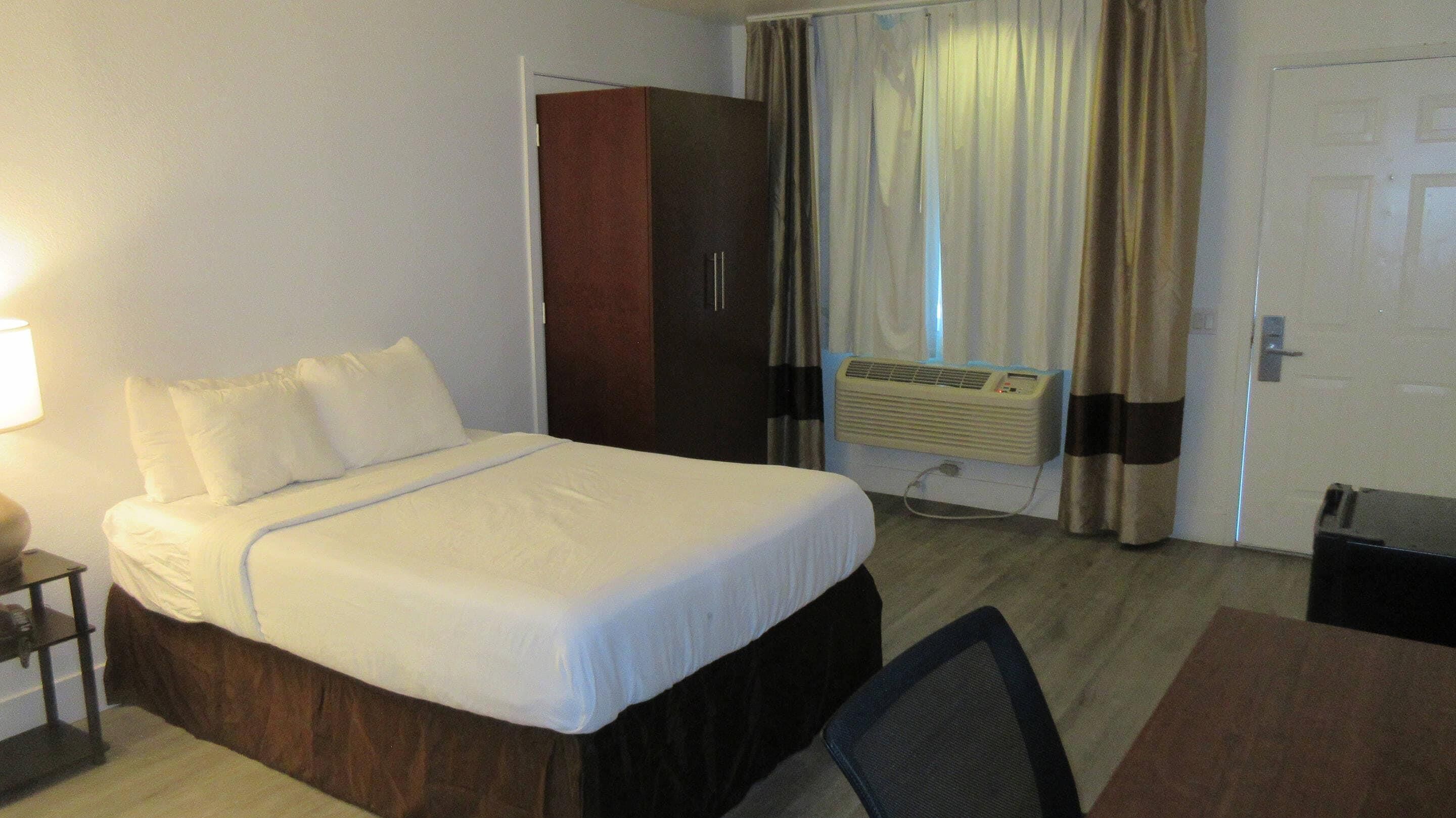 Standard Room, 2 Queen Beds, Non Smoking | Desk, blackout curtains, free WiFi, bed sheets