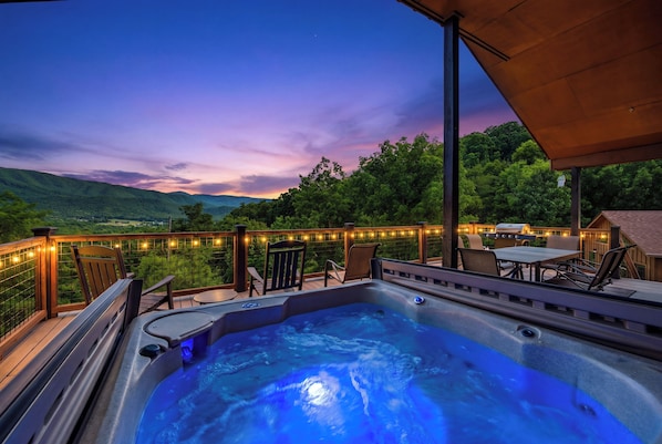 Soak in the hot tub under the stars