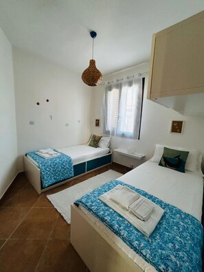 2 عدّة غرف نوم ومكواة/لوح كي وواي فاي وملاءات أسرّة