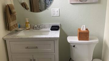 Hair dryer, towels, soap, toilet paper