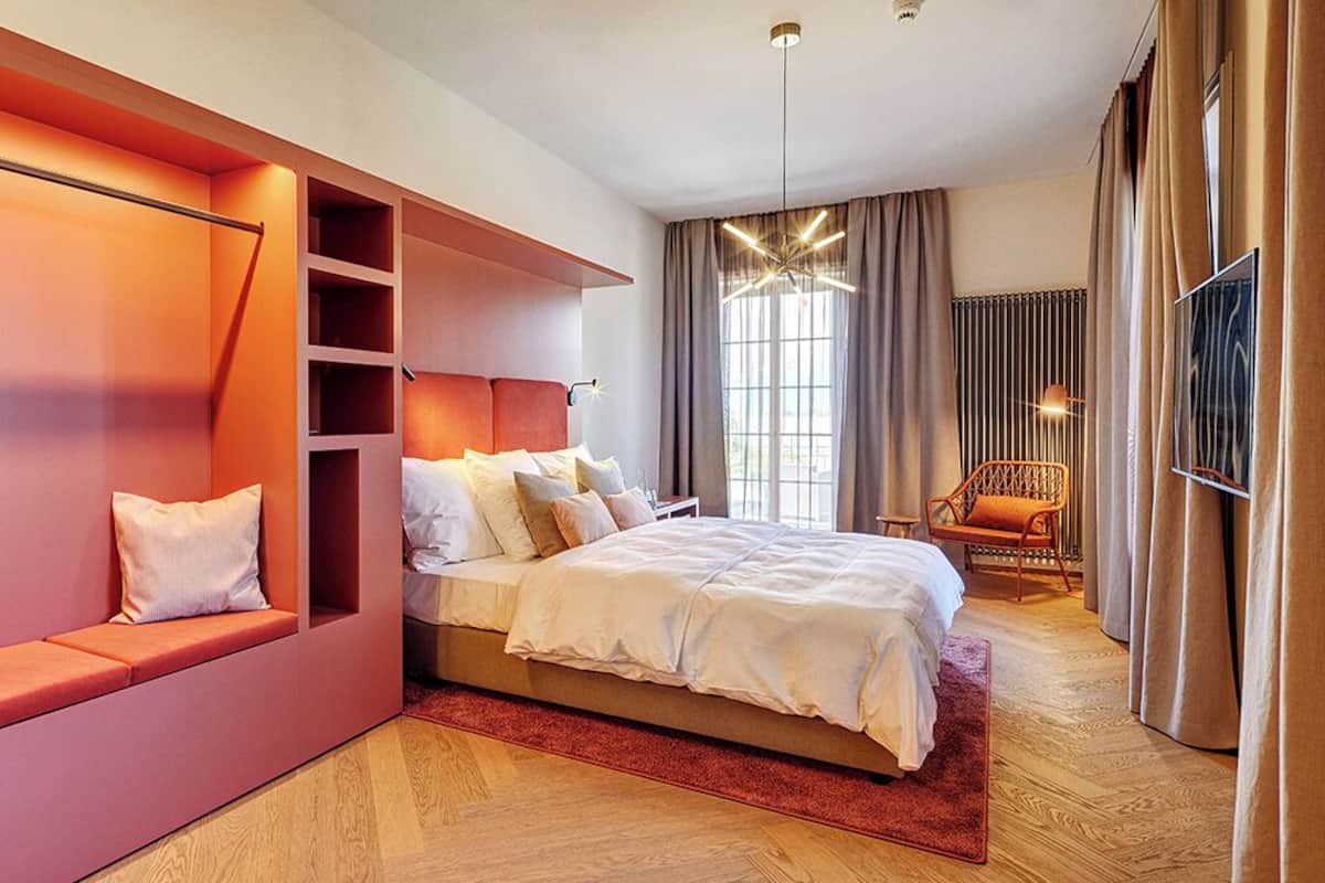 Junior Suite, Patio, Lake View | In-room safe, blackout drapes, free WiFi