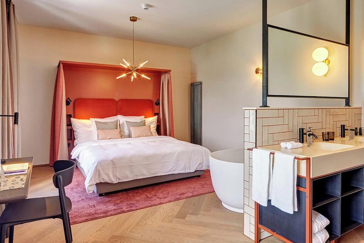 Deluxe Suite, Patio, Lake View | In-room safe, blackout drapes, free WiFi