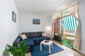 TV, video games - Apartment 'Brisa De Mar' with Mountain Views, Balcony, and Wi-Fi (Puerto de Naos)