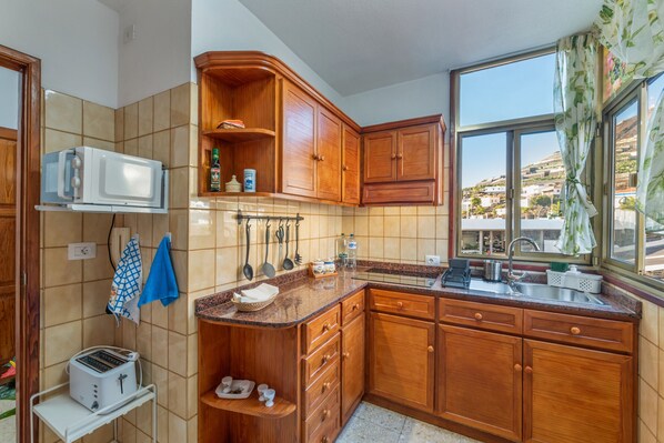 Fridge, microwave, stovetop, coffee/tea maker - Apartment 'Brisa De Mar' with Mountain Views, Balcony, and Wi-Fi (Puerto de Naos)