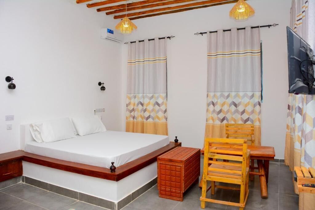 1 habitación, tabla de planchar con plancha y wifi 