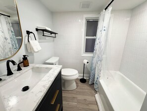 Hair dryer, towels, soap, toilet paper