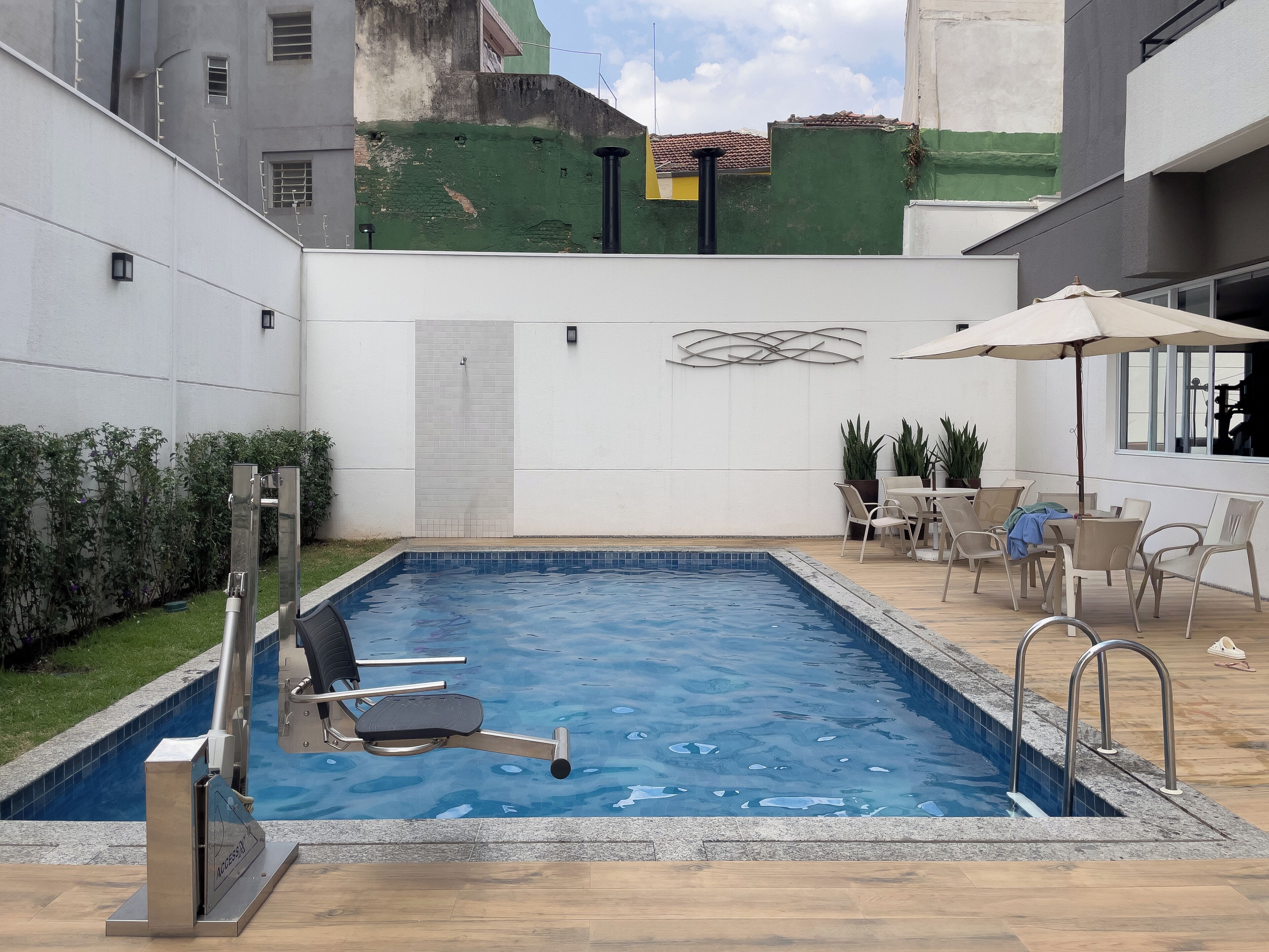 Outdoor pool, open 8:00 AM to 9:00 PM, pool umbrellas, sun loungers