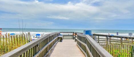 On the beach, sun loungers, beach towels