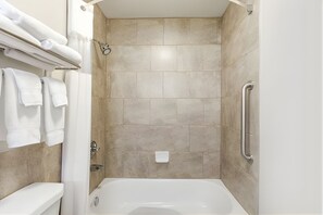 Combined shower/tub, hair dryer, towels, soap