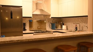 Appartement Luxe, patio, vue jardin | Cuisine privée