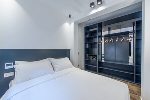 In-room safe, desk, laptop workspace, blackout curtains