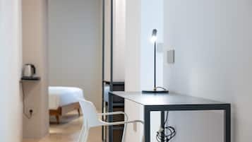 Deluxe Room, City View | In-room safe, desk, laptop workspace, blackout drapes