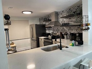 Fridge, microwave, oven, stovetop - Lakefront 2BR Bradenton Rental Near IMG & Beaches (South Bradenton)