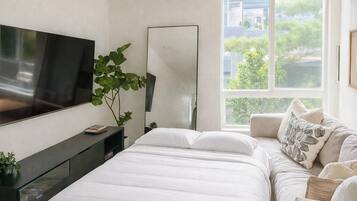 2 bedrooms, desk, iron/ironing board, travel crib