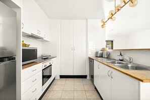 Apartment | Private kitchen - Spacious 2-bed, 2-bath Moments From Avalon Beach (Sydney)