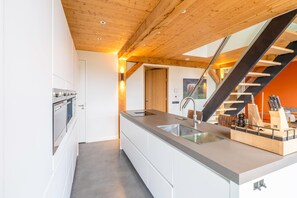 Villa | Private kitchen | Highchair - Luxurious and Sustainable 6-person Holiday Villa (De Koog)