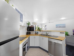 Apartment | Private kitchen - 2-bed Escape With Pool, Steps From Torquay Beach (Hervey Bay)