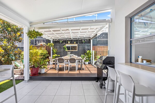 Apartamento | Restaurante al aire libre