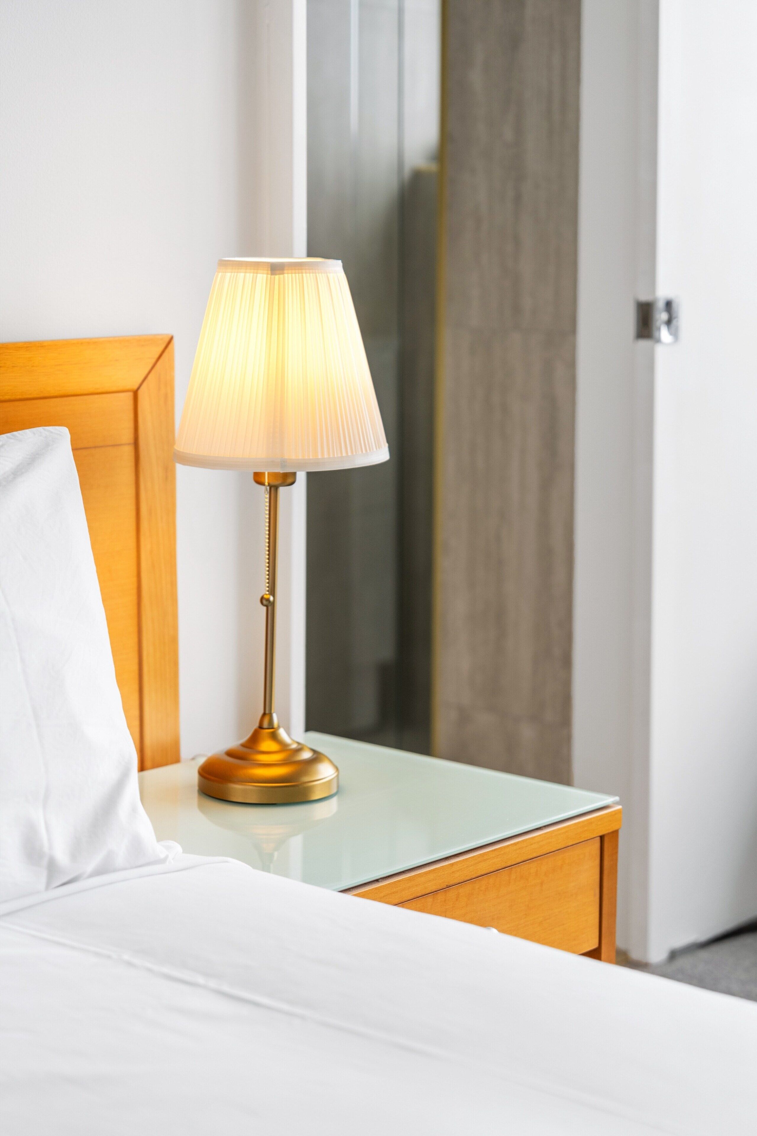 1 غرفة نوم ومساحة عمل للكمبيوتر المحمول ومكواة/لوح كي وملاءات أسرّة