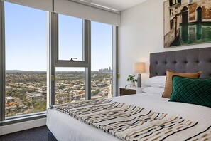 1 غرفة نوم ومكواة/لوح كي وملاءات أسرّة