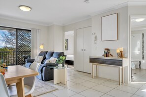Apartment | Living room - Bright 2-bed With Private Balcony & Serene View (Brisbane)