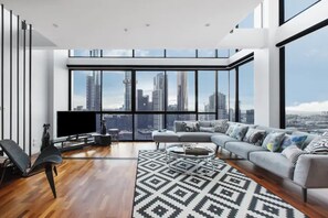 Living room - Incredible City Views in Convenient CBD Apartment (Melbourne)