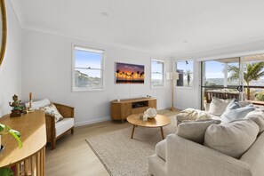 Apartment | Living room - Chic Coastal 1-bedroom Home With Balcony & BBQ (Sydney)