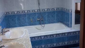 Shower, jetted bath, hair dryer, bidet