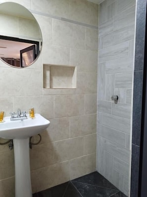 Shower, towels, soap, shampoo