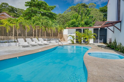 Cozy family home with enclosed yard, outdoor patio, pool & near the beach