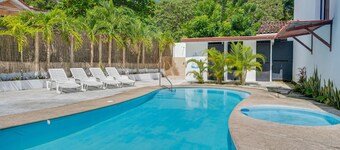 Cozy family home with enclosed yard, outdoor patio, pool & near the beach