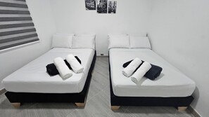 2 عدّة غرف نوم ومكواة/لوح كي وواي فاي مجانًا وملاءات أسرّة