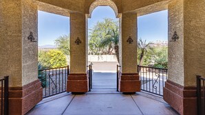 A covered outdoor area with a view of a garden and mountains. - Groups Welcome! Home w/ Pool + Patio in N Phoenix (Phoenix)