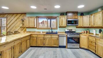 Microwave, stovetop, dishwasher, coffee/tea maker