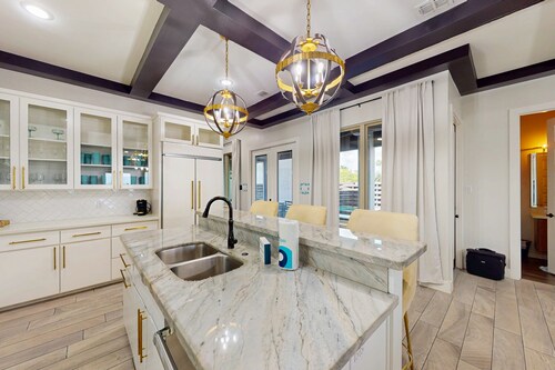 Stunning waterfront home with private pool, gym, & grill - steps to sand & SPI