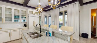 Stunning waterfront home with private pool, gym, & grill - steps to sand & SPI