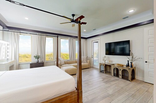 Stunning waterfront home with private pool, gym, & grill - steps to sand & SPI