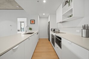 Apartment | Private kitchen - Bright 2-bed Apartment With Gym, BBQ & Pool Access (Canberra)