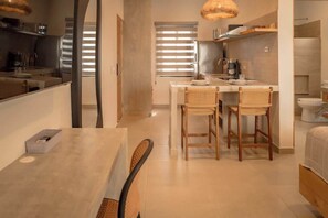 Fridge, microwave, stovetop, coffee/tea maker