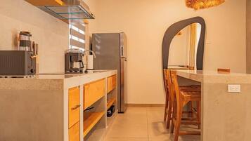 Fridge, microwave, stovetop, coffee/tea maker