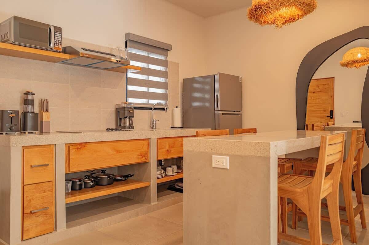 Fridge, microwave, stovetop, coffee/tea maker