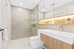 Shower, hair dryer, towels, soap