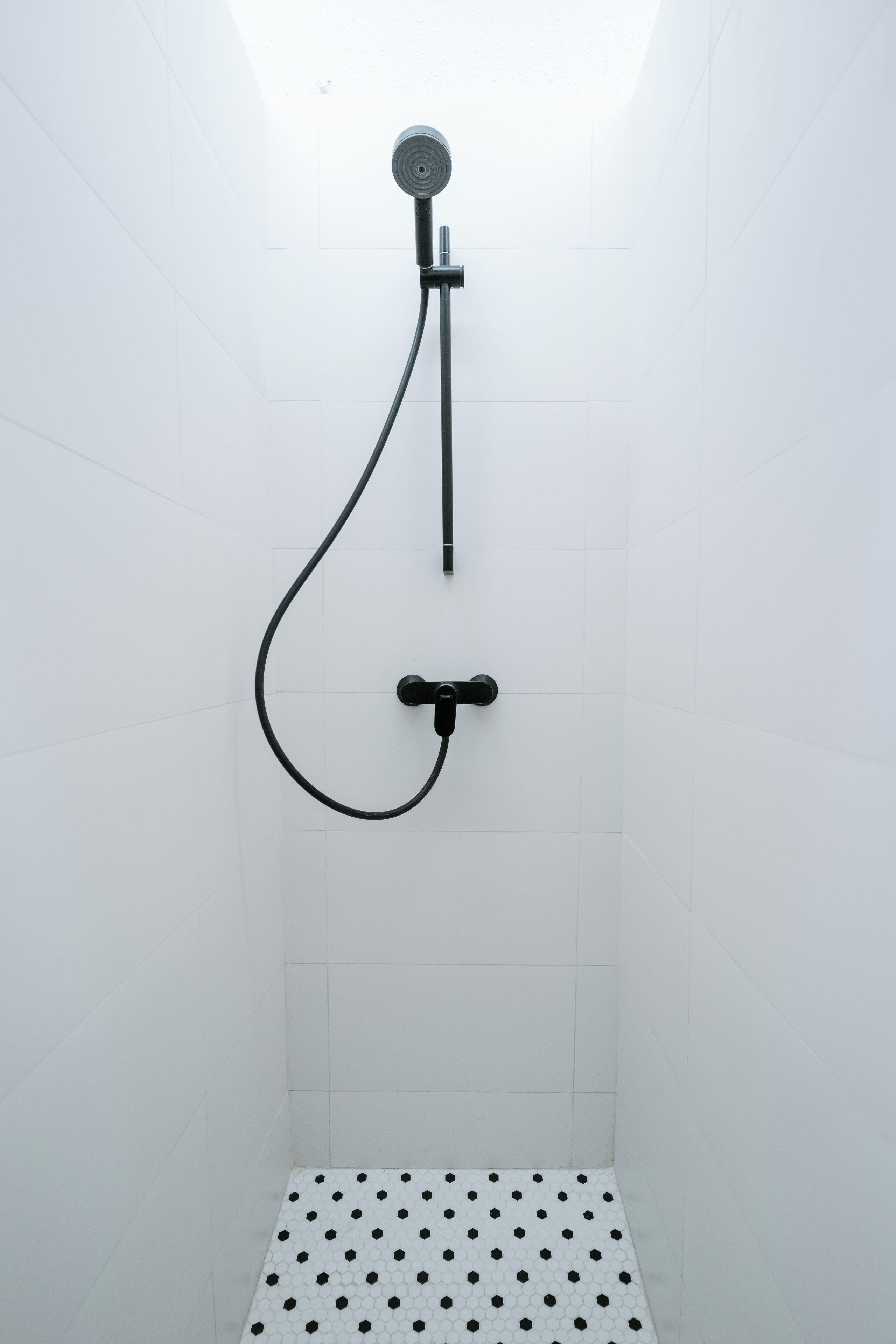 Shower, eco-friendly toiletries, hair dryer, towels
