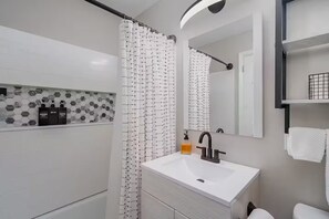 Hair dryer, towels, soap, toilet paper
