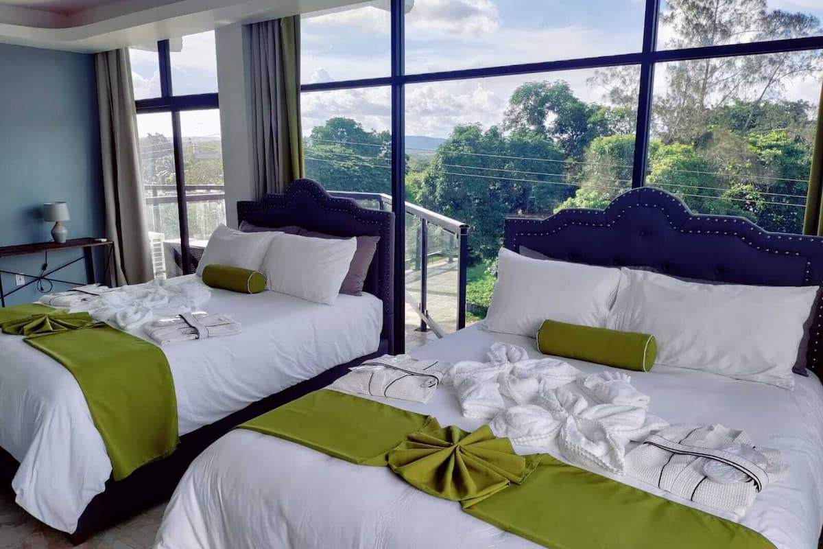 Comfort Suite, Balcony | In-room safe, laptop workspace, blackout drapes, iron/ironing board