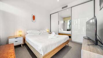 Departamento | 2 habitaciones, tabla de planchar con plancha y ropa de cama