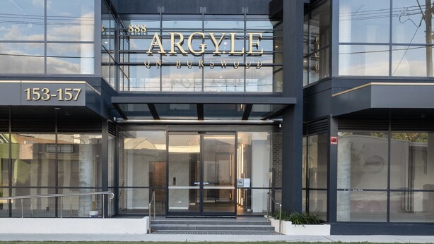 A modern building with large glass windows and a sign that reads "ARGYLE ON BURSWOOD 153-157". - Stylish 1-bed Apartment With Rooftop Access (Perth)